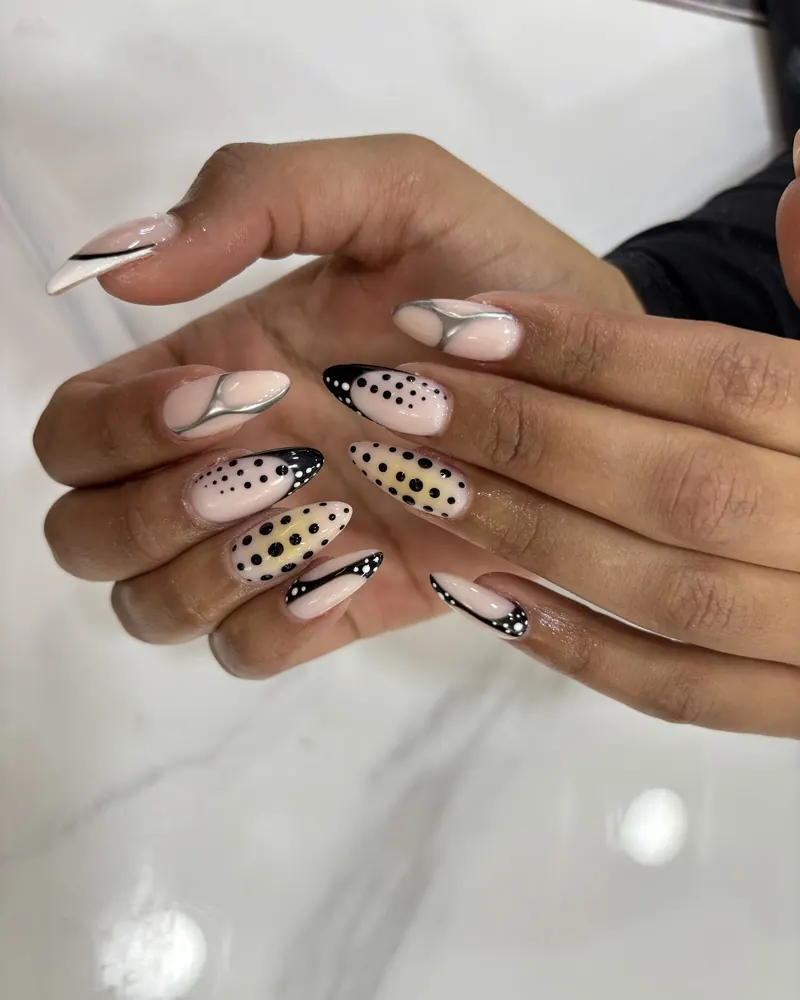 Nude nails with black polka dot art at Chillux Nails, Orpington